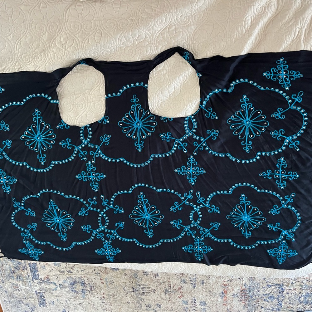 New without tags. Beautiful cover up. Embroidery and sequin. Never worn.